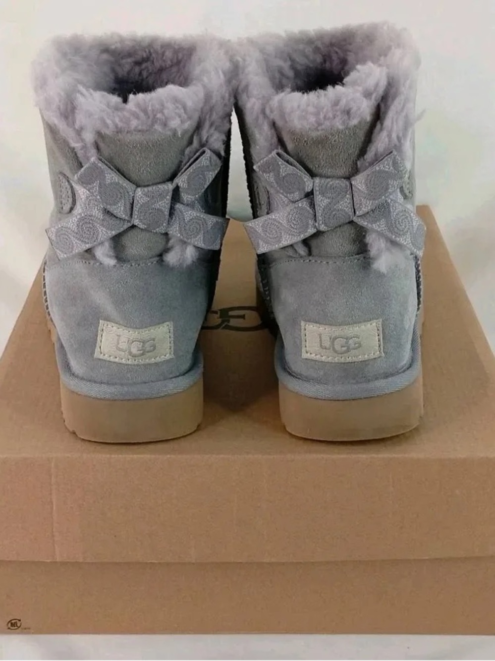 UGG Amethyst Swirl Suede Shearling Short Boot with Bow Detail
